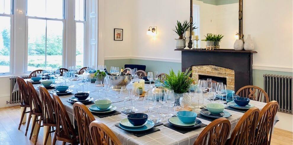 nicely decorated dining room with table