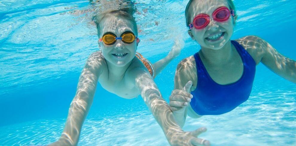 Children swimming under water