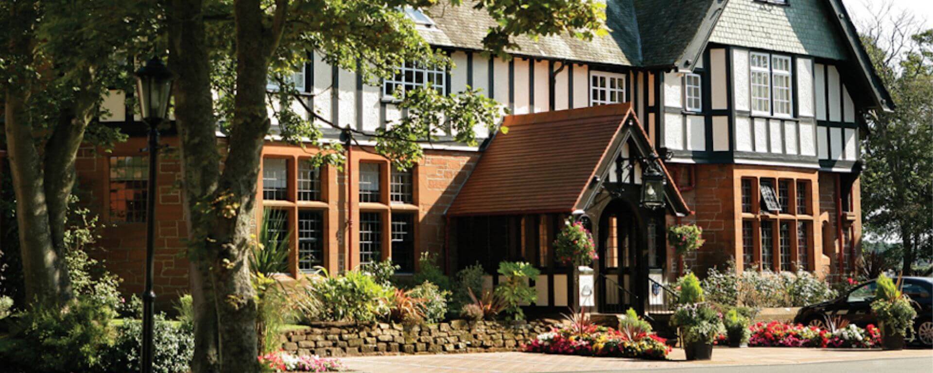 Grand looking Tudor style hotel.