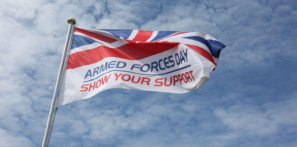 Flag flying with Union Jack and the title Armed Forces Day Show Your Support