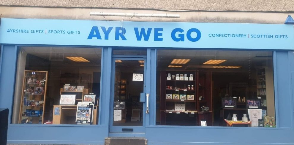 Blue shop frontage with an Ayr We Go sign