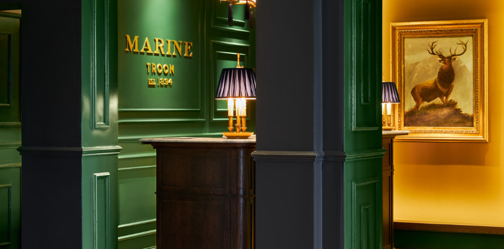 Dark green reception hallway.