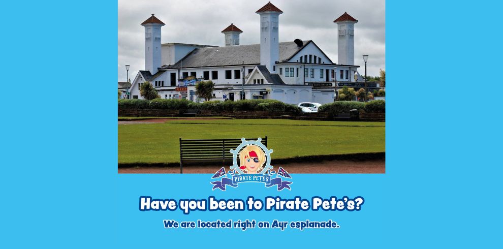An image of the outside of a large white building with text that says 'Have you been to Pirate Pete's?'