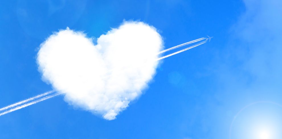 Love heart made of clouds in a blue sky.