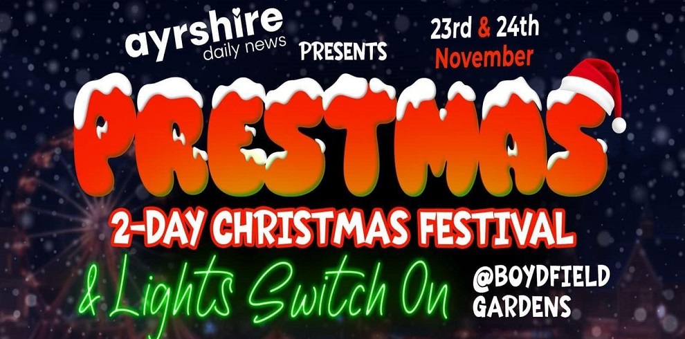 The image is a promotional poster for a Christmas event. The top text reads, "Ayrshire Daily News presents," followed by the main title in large, festive letters, "PRESTMAS," designed in red with white, snow-like caps on top of each letter and a Santa hat on the letter "S." Below the main title, it says, "2-Day Christmas Festival & Lights Switch On" in bold red and green text. The event dates, "23rd & 24th November," appear in smaller red and white text at the top right. The location, "@Boydfield Gardens," is noted in white text at the bottom. The background has a dark, wintery, bokeh effect with subtle lights, giving a holiday feel.