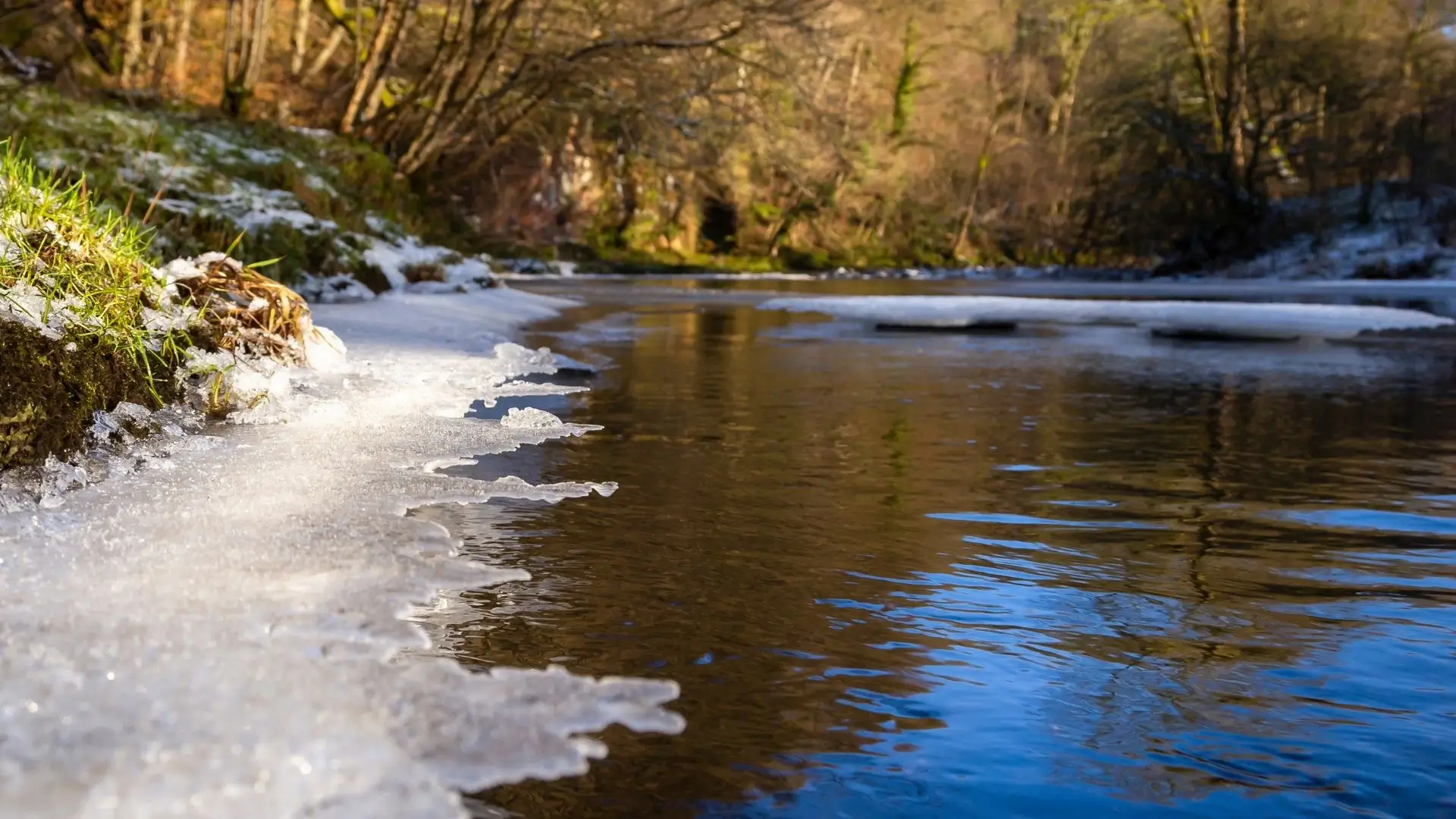 River slightly frozen along the banks.