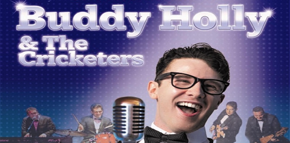 The title Buddy Holly and The Cricketers and the cast on stage singing.