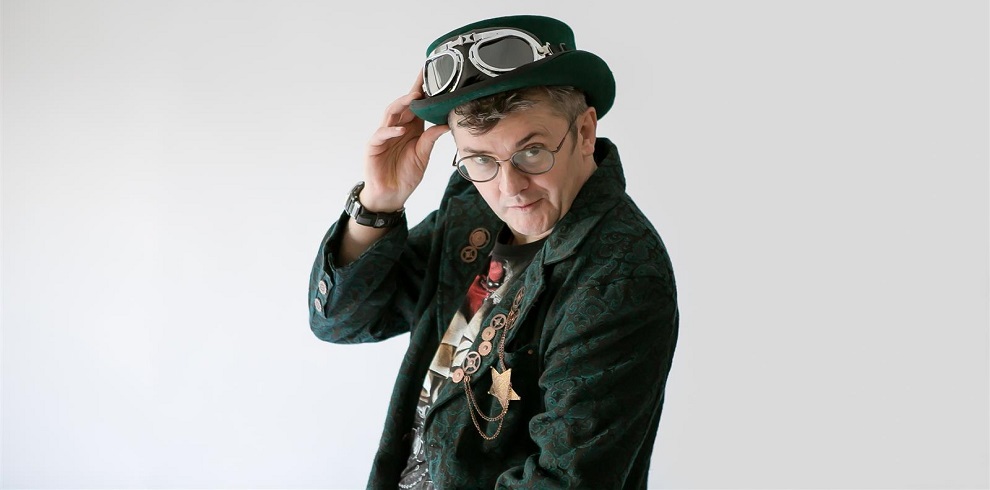 A pciture of Joe Pasquale, holding his hat.