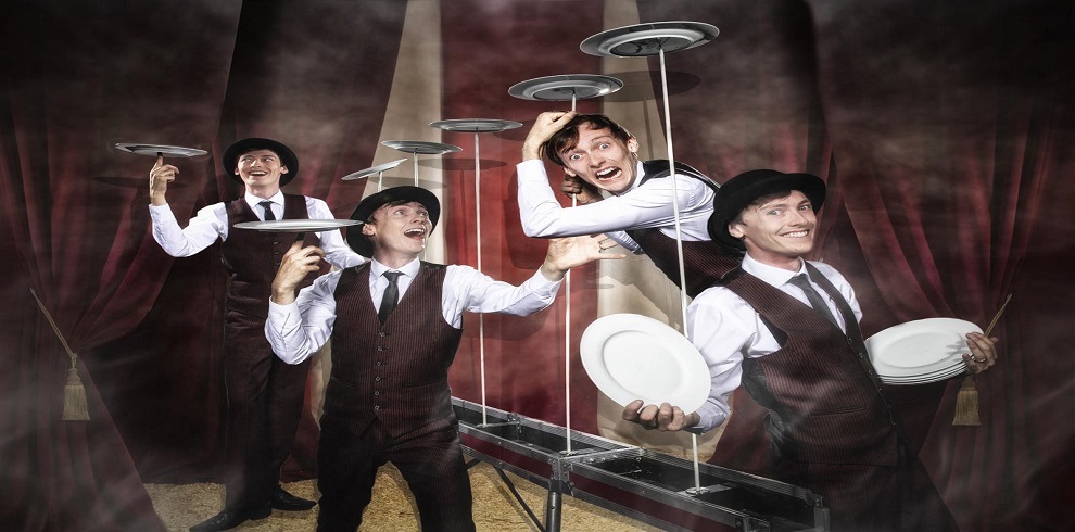 IMAGE OF MICHAEL JORDAN’S MAGIC AND MARVELS AT THE GAIETY THEATRE, AYR. IMAGE SHOWS 4 IDENTICAL MEN SPINNING PLATES.