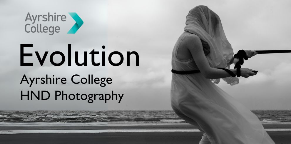 Black and white photograph of person dressed in white pulling a rope overlayed with the text - Ayrshire College Evolution HND Photography Exhibition.
