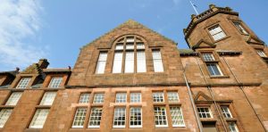 Red sandstone exterior of the McKechnie Institute.