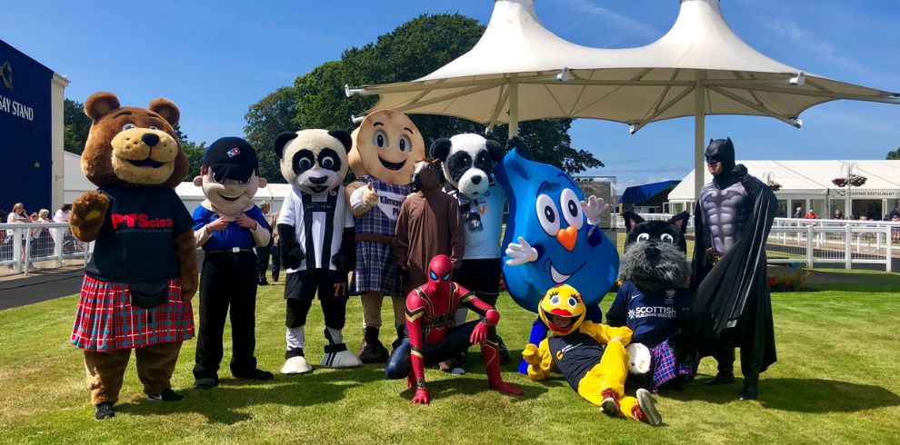 A photograph of characters at Glasgow Fair Family Day at the Racecourse, Ayr.