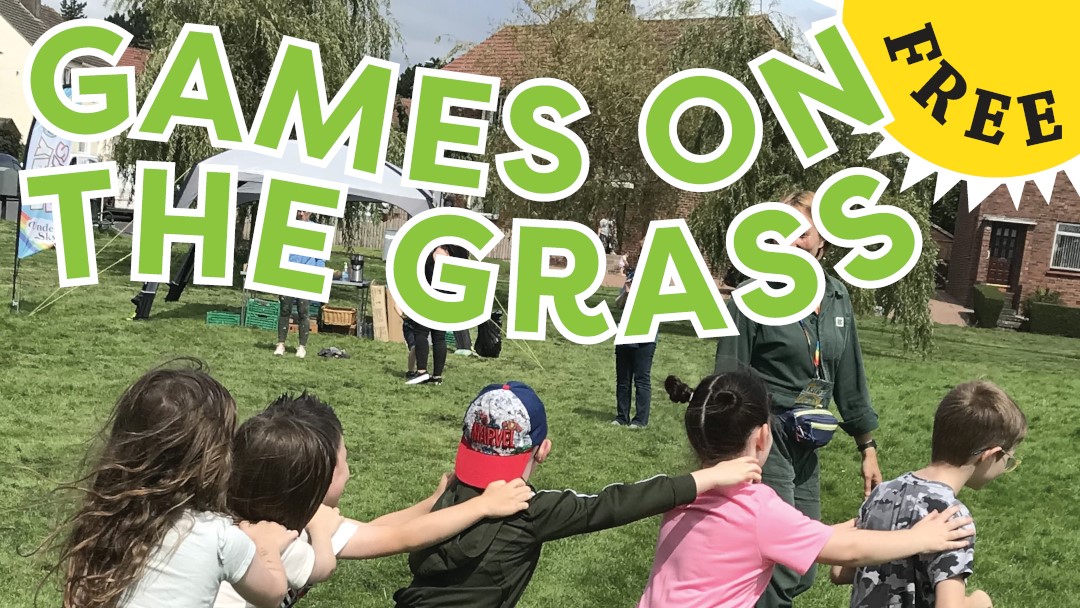 A picture of a group of children enjoying themselves outside. The title says Games on the Grass.