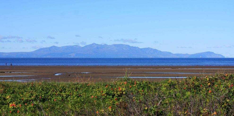View of the sea, sand and hills or Arran.
