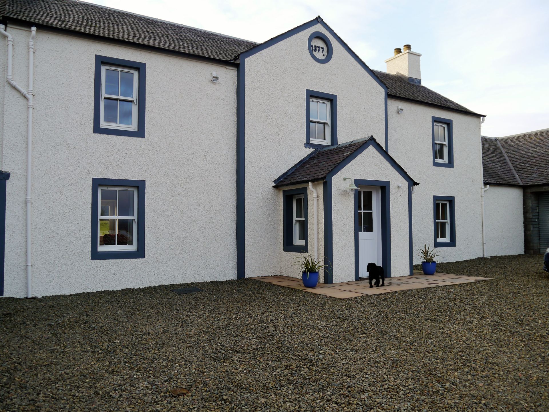 Outside image of a farmhouse.