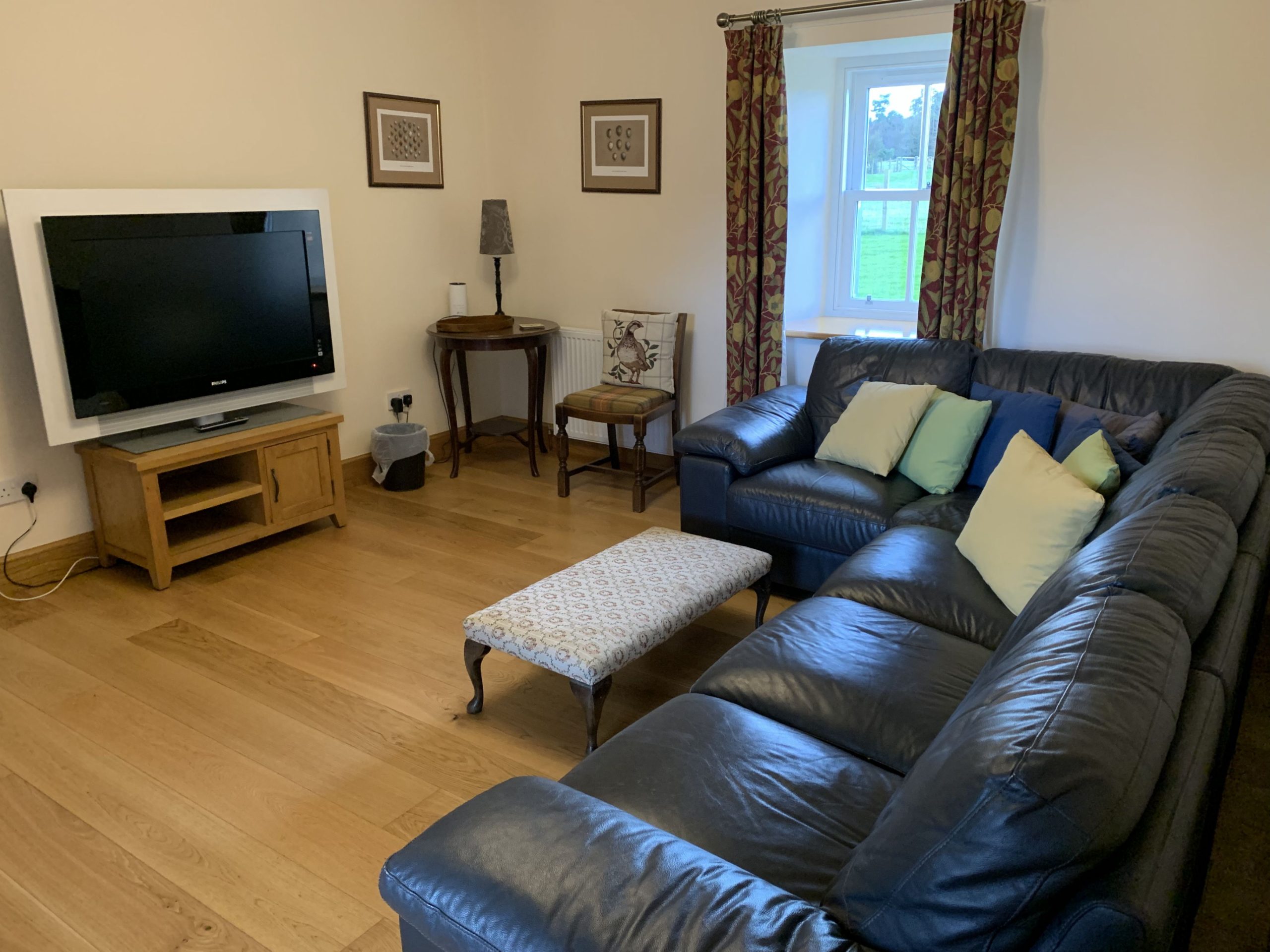 an image of a living room with a television.