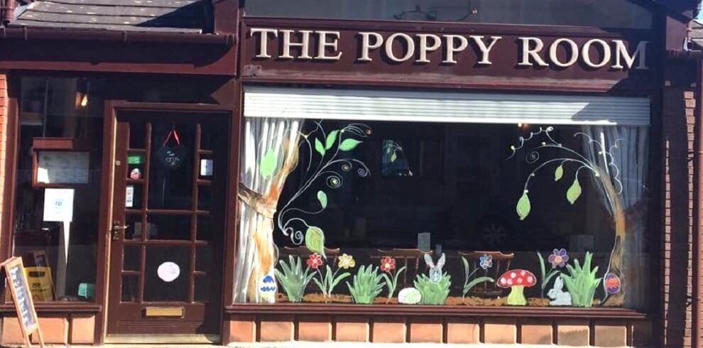 A picture of the outside of the Poppy Room.
