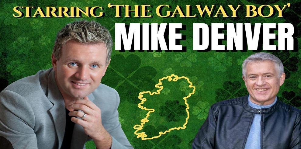 A poster featuring Mike Denver and Dominic Kirwan, both smiling. The background is green with a map of Ireland and scattered four-leaf clovers. Bold text reads, 'Starring The Galway Boy Mike Denver,' highlighting the show's Irish theme.