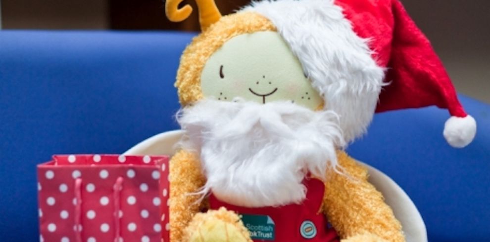 An image of Bookbug dressed up as Santa Claus.