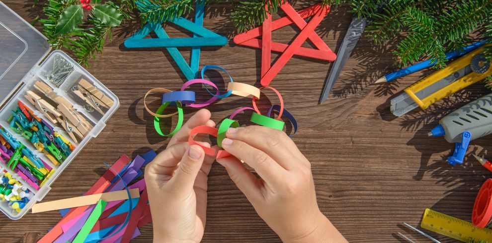 An image of a child's hands crafting.