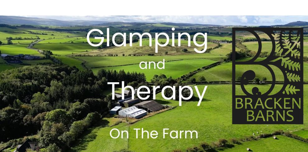 A scenic image with text that reads 'Glamping and Therapy On the Farm'.