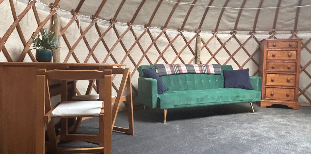 The interior of a glamping yurt.