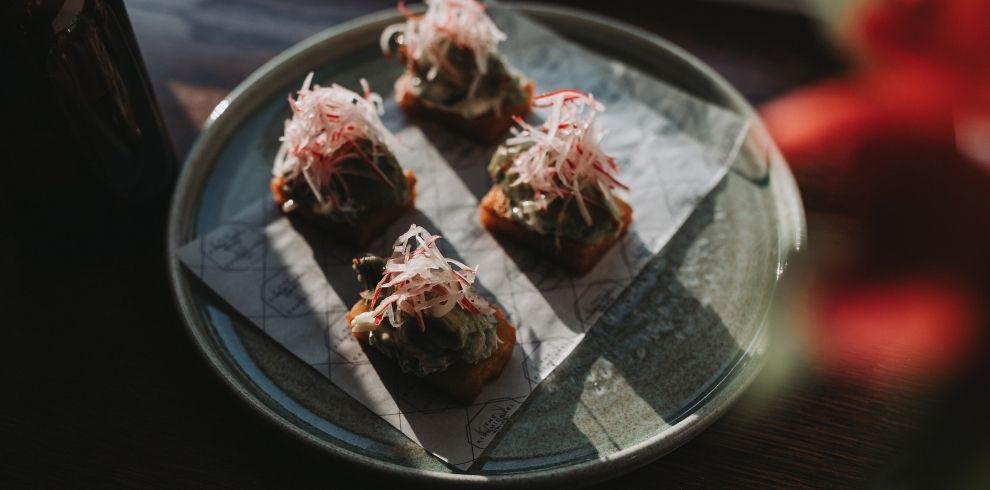 An image of Sushi presented on a plate.