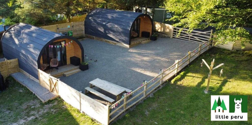 An aerial image of two glamping pods.