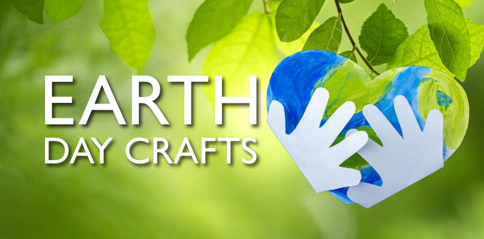 Earth Day Crafts text against a green leaves background. White paper hands surrounding heart shaped earch