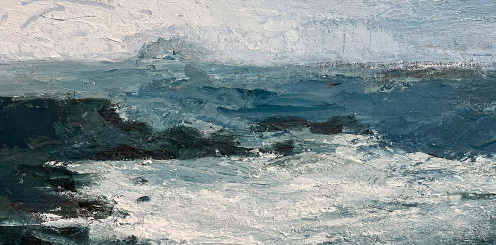 An oil painting of a seascape, depicting a turbulent ocean with crashing waves in shades of blue, white, and deep green. The thick, textured brushstrokes give a sense of movement and energy to the water. In the background, a misty landmass or rocky formation emerges from the sea, partially obscured by the atmospheric haze. The sky is overcast with a mix of light gray and white tones, blending seamlessly into the distant horizon. The painting has an impressionistic style, emphasizing the raw power and beauty of the ocean.