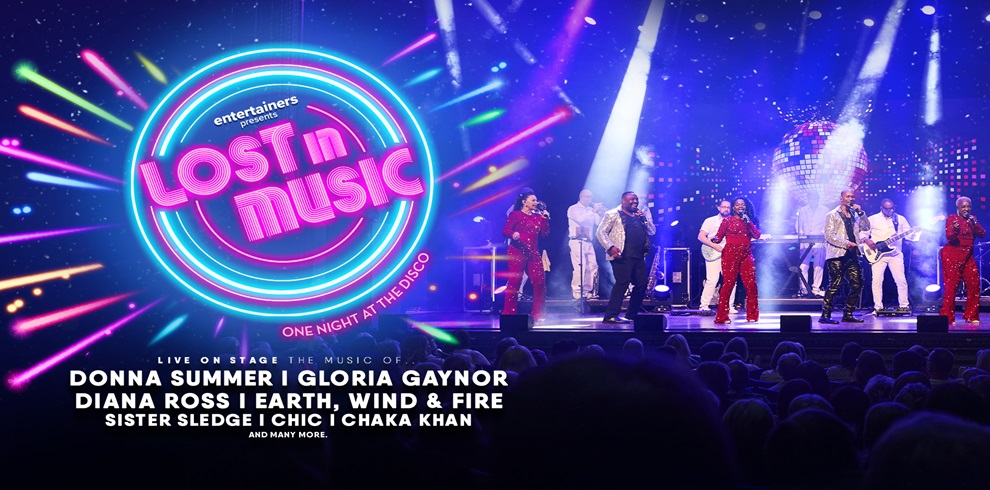 A vibrant concert stage with performers dressed in colorful outfits, singing and dancing. The background features bright lights and a large screen displaying various visual effects. On the left side of the image, there is a neon sign that reads: 'entertainers presents LOST in MUSIC ONE NIGHT AT THE DISCO.' Below this sign, there is text that reads: 'LIVE ON STAGE THE MUSIC OF DONNA SUMMER | GLORIA GAYNOR DIANA ROSS | EARTH, WIND & FIRE SISTER SLEDGE | CHIC | CHAKA KHAN AND MANY MORE.