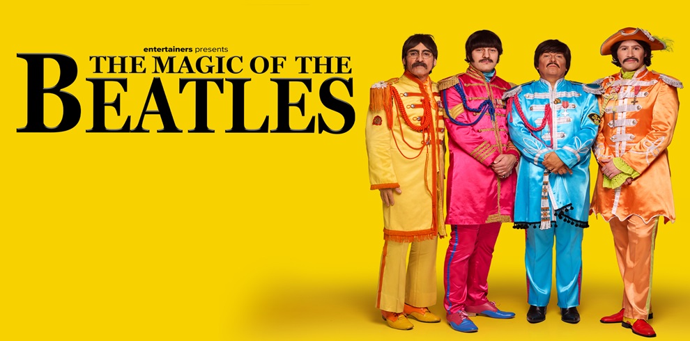 The image shows four individuals dressed in colorful, vintage-style military uniforms reminiscent of the Beatles' Sgt. Pepper's Lonely Hearts Club Band album cover. They stand against a bright yellow background. The text on the left side reads "entertainers presents THE MAGIC OF THE BEATLES" in large black letters.