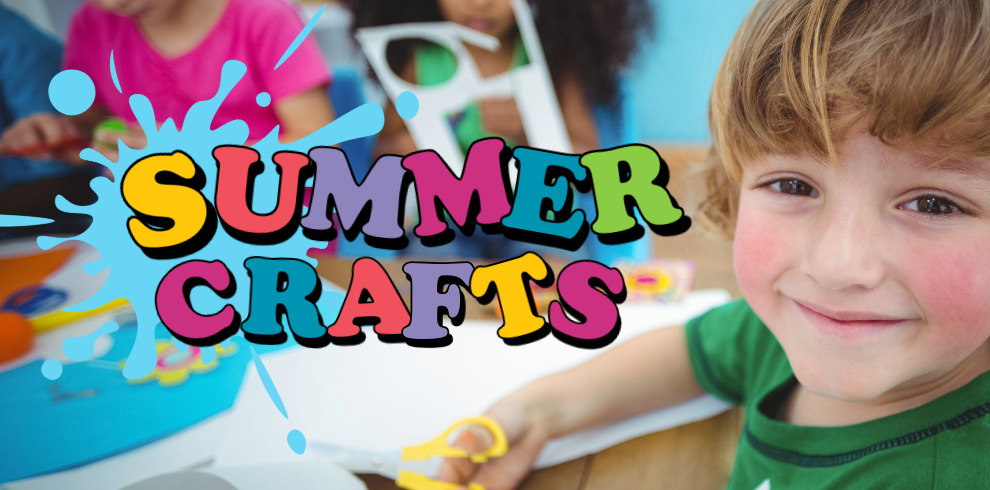 A cheerful young boy smiles at the camera while holding yellow scissors, surrounded by colorful paper and craft materials. In the background, other children are engaged in arts and crafts. Bold, playful text in bright colors reads "Summer Crafts" with a blue paint splatter design behind it.