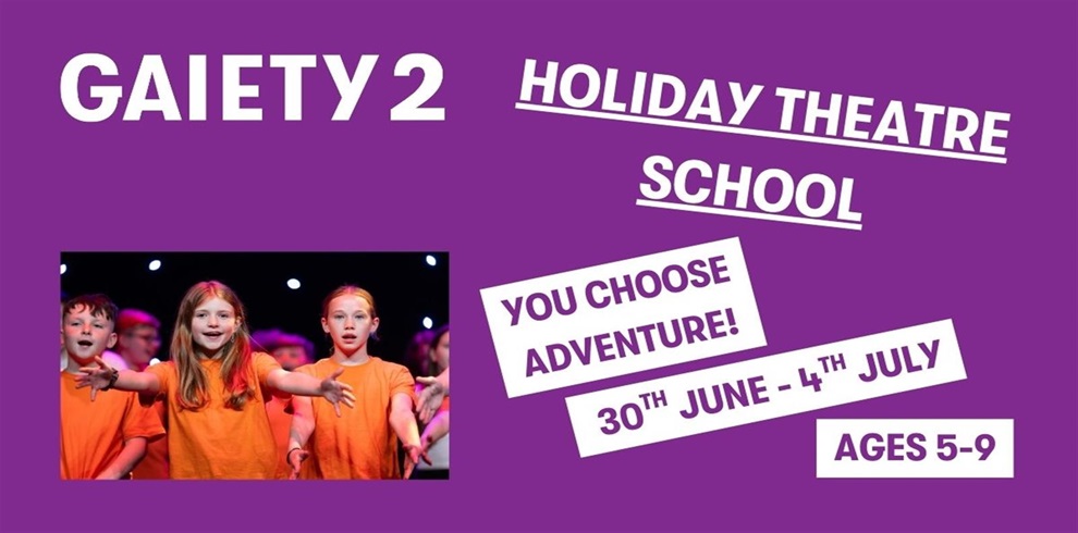 Promotional poster for "Gaiety 2 Holiday Theatre School" on a purple background. Features a photo of young children performing on stage in orange shirts. Text reads: "YOU CHOOSE ADVENTURE! 30th June – 4th July. Ages 5–9.