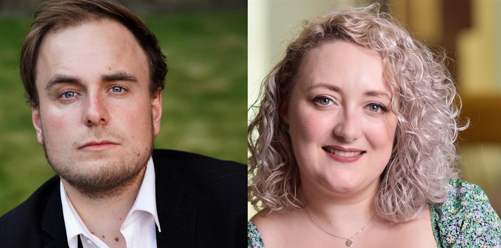 The image is a side-by-side portrait of two people. On the left is a man with light skin, short brown hair, and blue eyes, wearing a white collared shirt and a dark jacket, looking directly at the camera with a serious expression. The background is blurred greenery. On the right is a woman with light skin, light blonde curly hair, and blue eyes, smiling slightly. She is wearing a green floral top and a delicate necklace. The background is softly blurred in warm tones.