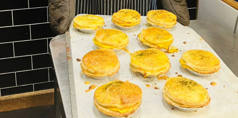 Delicious looking pies on a tray.