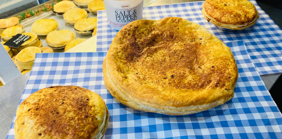 Delicious looking pies on a table.