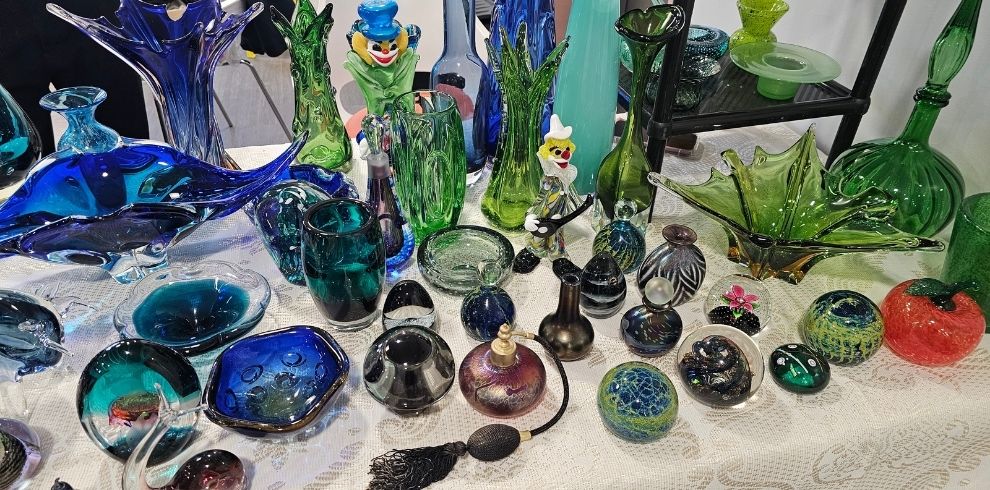 An image of stained glassware presented on a table.