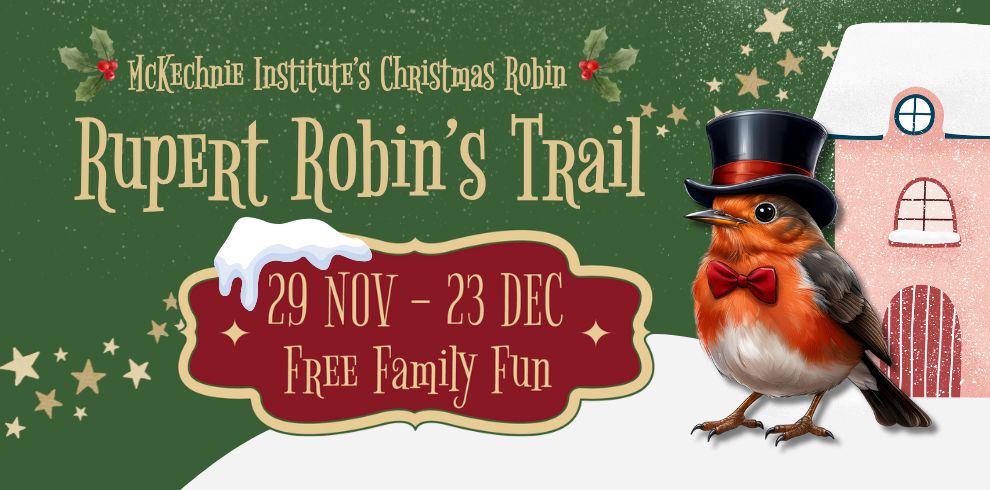 A festive graphic for “Rupert Robin’s Trail.” It features a cartoon robin wearing a black top hat and red bow tie, standing beside a pink snow-covered house. The background is green with gold stars and holly. Text reads: “McKechnie Institute’s Christmas Robin – Rupert Robin’s Trail – 29 Nov to 23 Dec – Free Family Fun.”