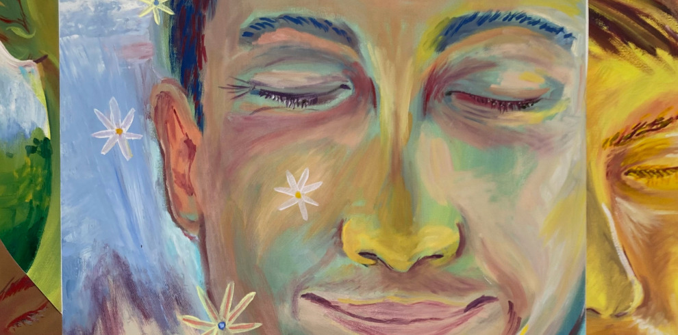 An expressive, colourful painting of a person’s face with their eyes closed, shown in soft pastel tones of green, blue, yellow, and pink. Small white flowers are painted across the face and background. The overall mood is peaceful and dreamy, with the artwork blending gentle brushstrokes and warm colours.