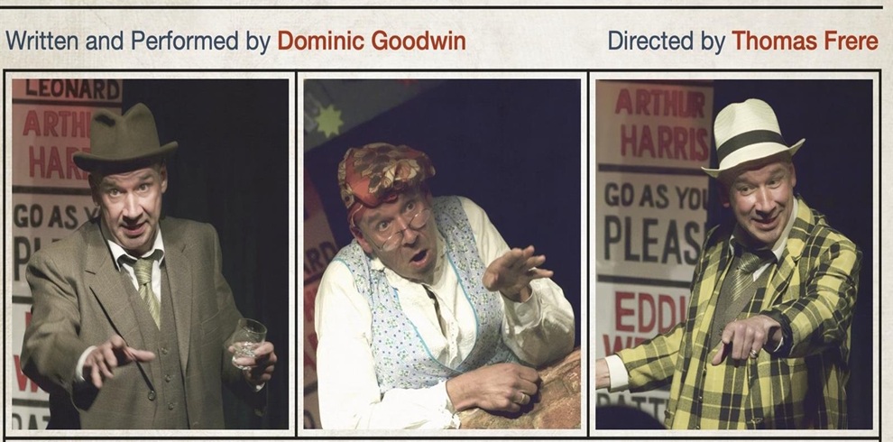 A theatrical promotional image divided into three panels, each showing a character in vintage-style clothing. The left panel features a person in a brown suit and hat holding a glass, with posters in the background. The center panel shows a person wearing a patterned headscarf and light-colored vest leaning forward. The right panel depicts a person in a yellow plaid jacket and white hat pointing outward. Text above the panels reads: “Written and Performed by Dominic Goodwin” and “Directed by Thomas Frere.”