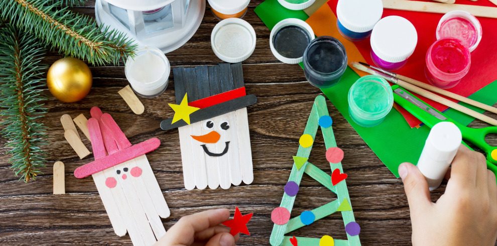 Hand making festive crafts and paint pots.