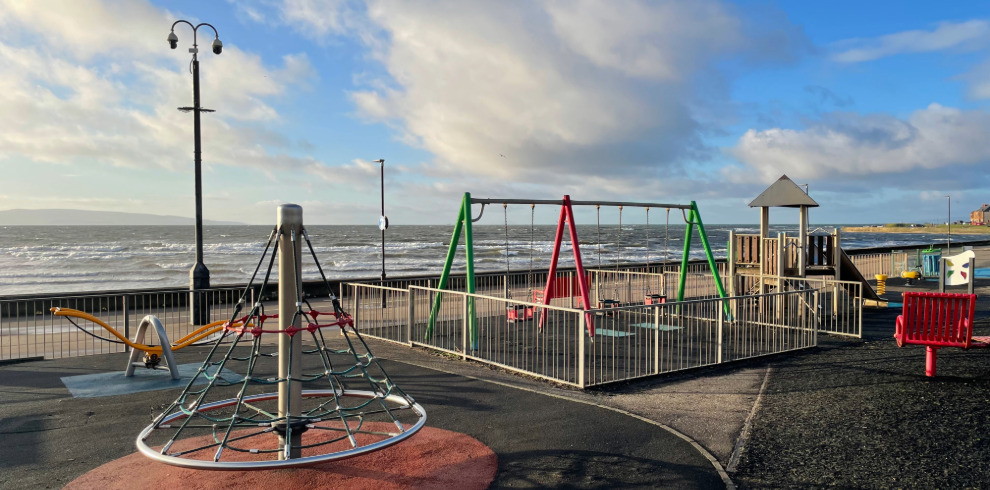 Outdoor play equipment at play park beside the beach.