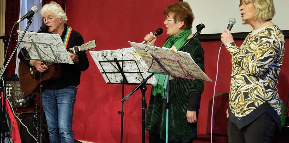 Group of musicians performing on stage.