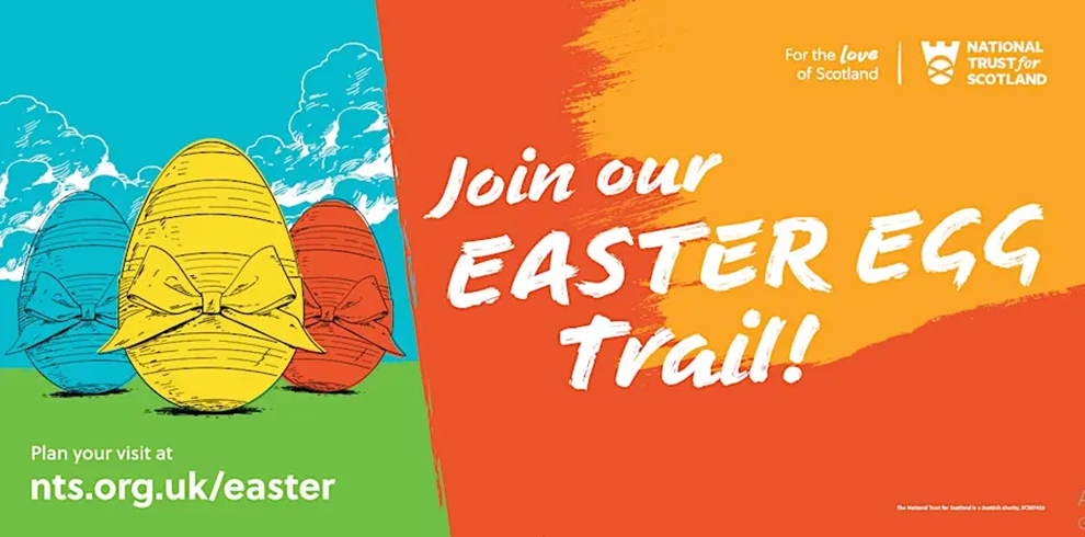 A colourful illustrated poster promoting an Easter Egg Trail. On the left, three large decorated Easter eggs—one yellow, one blue, and one red—sit on bright green grass beneath a blue sky with white clouds. On the right, an orange and yellow painted background carries the bold white text: “Join our Easter Egg Trail!” In the top right corner is the National Trust for Scotland logo with the words “For the love of Scotland.” At the bottom left, text reads: “Plan your visit at nts.org.uk/easter.”