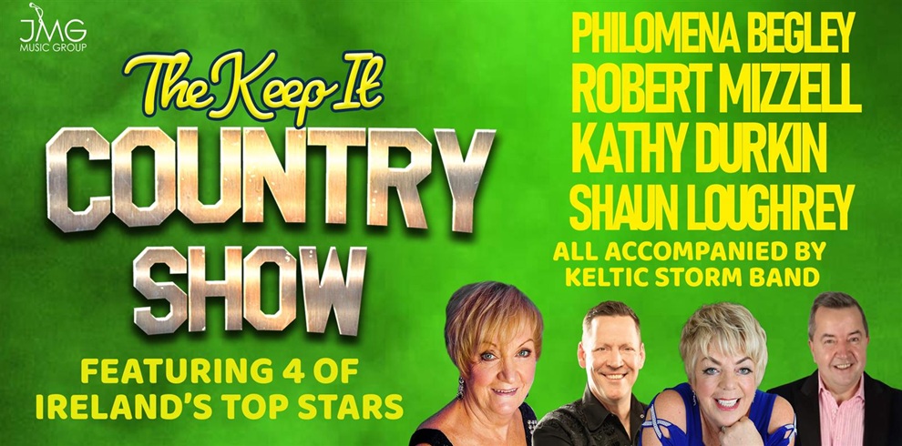 Promotional graphic for ‘The Keep It Country Show’ featuring a bright green background with bold gold and white lettering. The text promotes four artists—Philomena Begley, Robert Mizzell, Kathy Durkin and Shaun Loughrey—accompanied by the Keltic Storm Band. Along the bottom are images of the four performers standing side by side. The JMG Music Group logo appears in the top left corner.