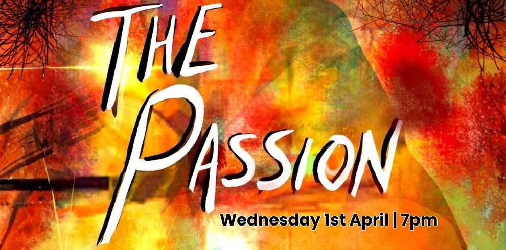 A vibrant, abstract poster with swirling red, orange, and yellow colors resembling paint or fire. In the center, large white handwritten-style text reads “THE PASSION.” Below this, smaller black text says “Wednesday 1st April | 7pm.” Dark, spiky, web-like shapes appear in the top corners, and faint silhouettes and textures blend into the colorful background.