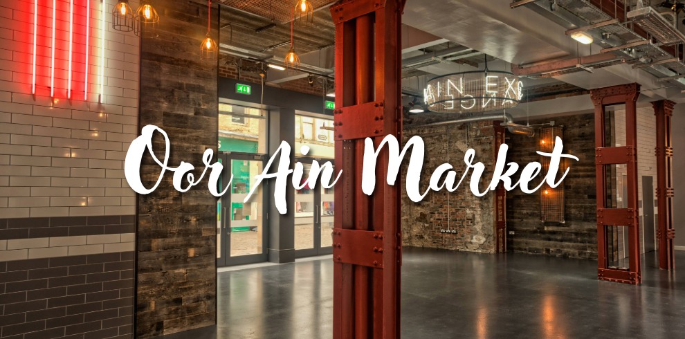 Interior of industrial building with the text 'Oor Ain Market'.