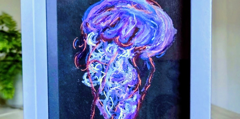 Art work in purples, whitesm looks like a jelly fish.