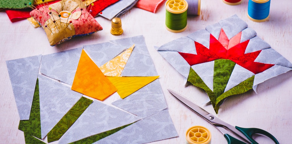 Flowers created from patchwork quilting.